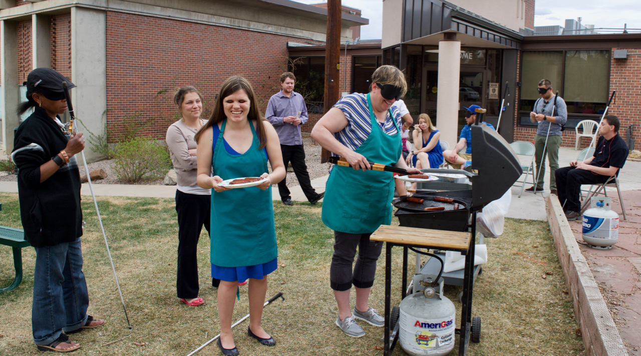 Delfina, Lyne, Kyra and Libby checking on brats out front on the grills