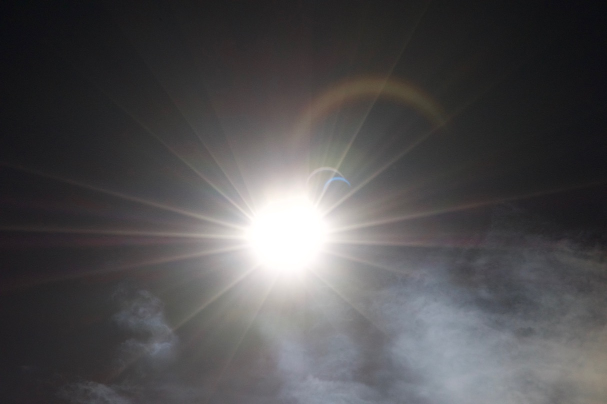 A view of the sun during the eclipse - lens flares show the actual eclipse shape