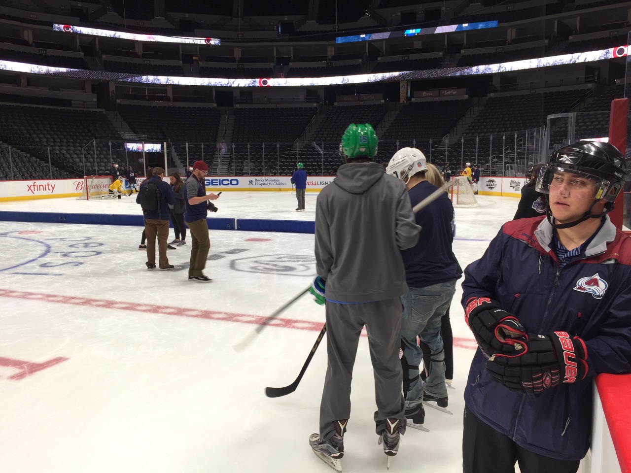 CCB students go out on the ice in their hockey gear.
