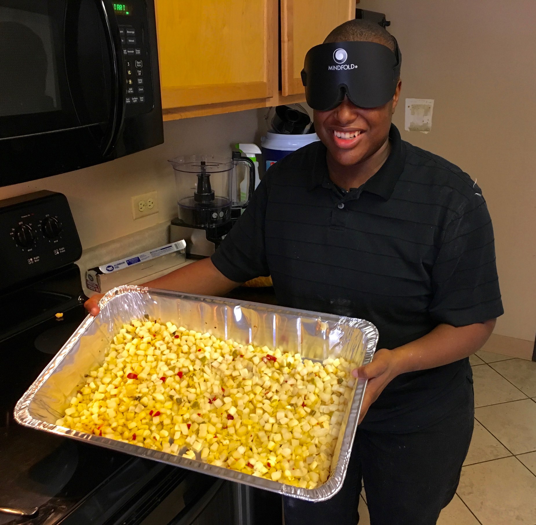 Christopher Dowdy shows us a tray of Hash Browns he made for his mini meal