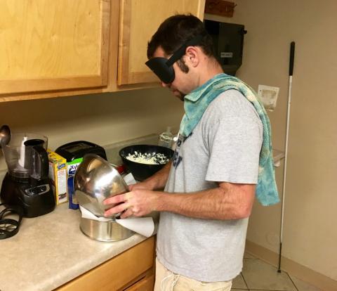 Marcus’ meal featured ribs and cheesecake. Here he’s pouring the mixture for his dessert into a pan.